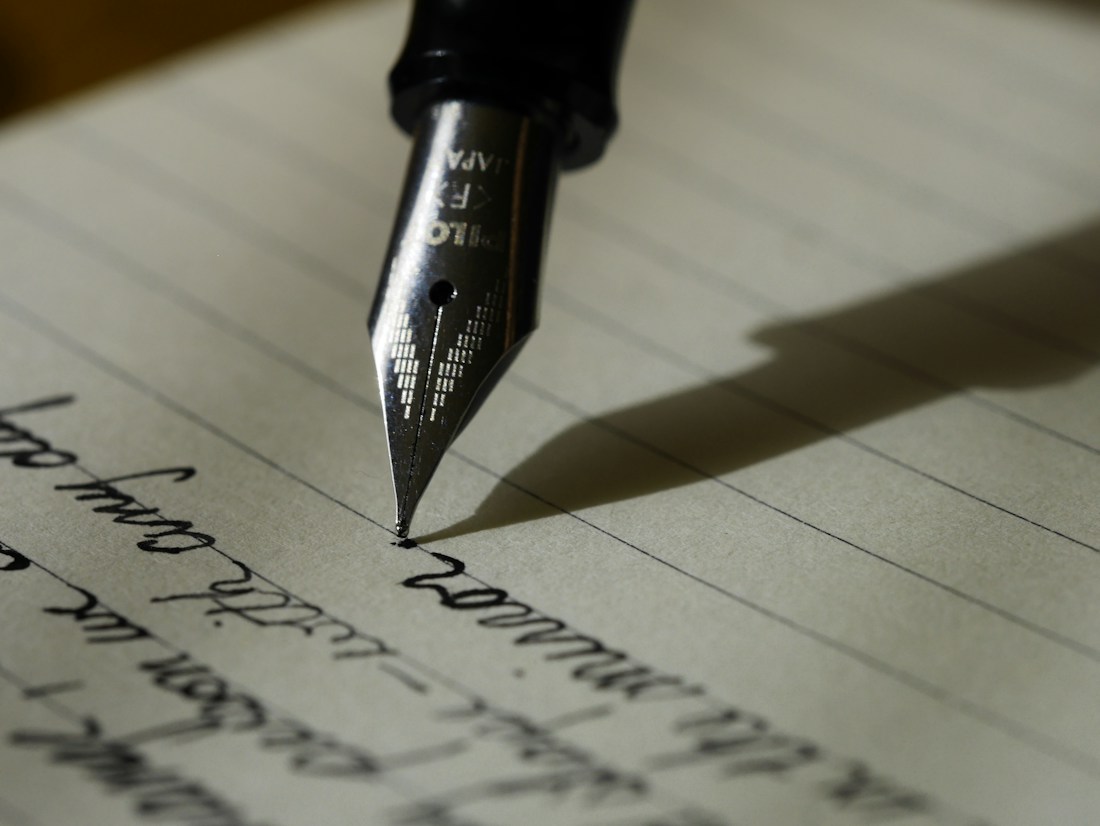 Notes and writing materials on a desk